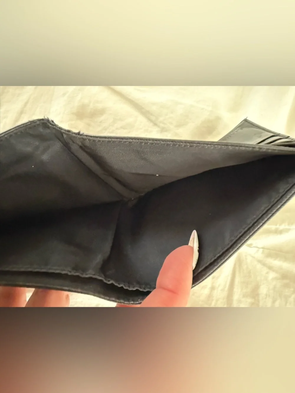 Prada triangle logo bifold wallet